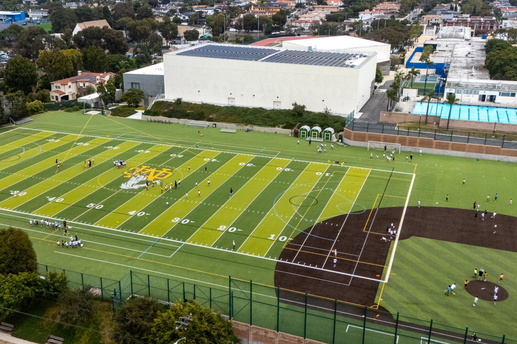 Aerial view of student athletes training on the Mira Costa field